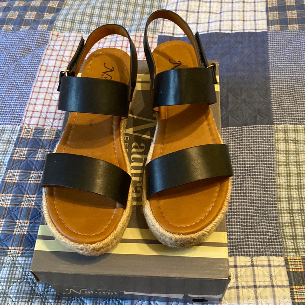 Black wedge sandals size women’s 9 1 inch 1/2 inch heels.